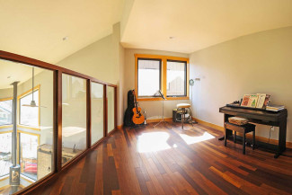 Loft over kitchen / dining room overlooks living room